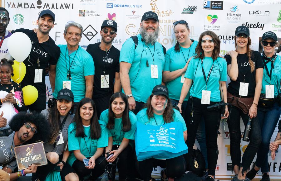 Helping the Unhoused: Change The World with Justin Baldoni at The Skid Row Carnival of Love