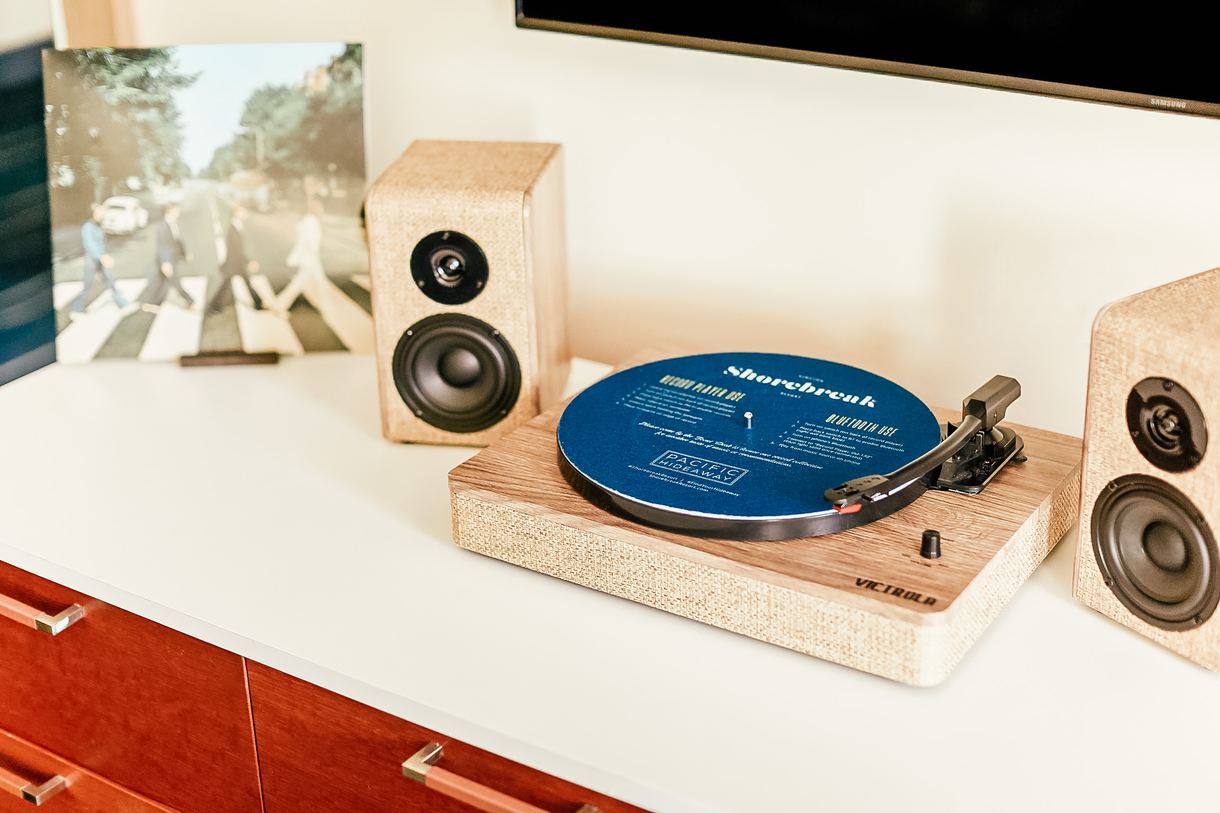 Every guest room features a vinyl record player.