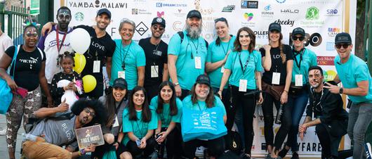 Helping the Unhoused: Change The World with Justin Baldoni at The Skid Row Carnival of Love