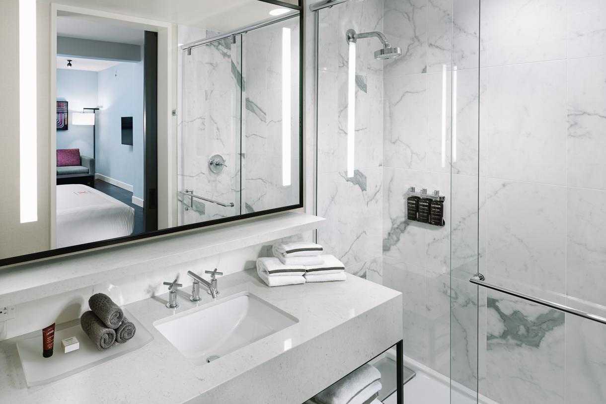 All guest rooms feature walk-in, marble showers