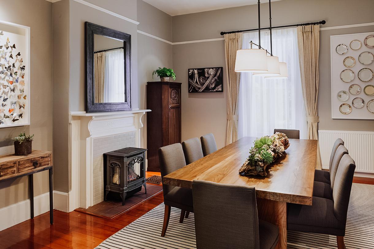 Suites also have a spacious, swanky dining area where guests can enjoy a meal.