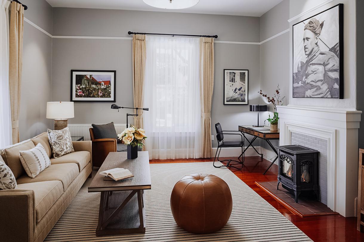 The thoughtfully appointed living rooms are graced by historic photographs.