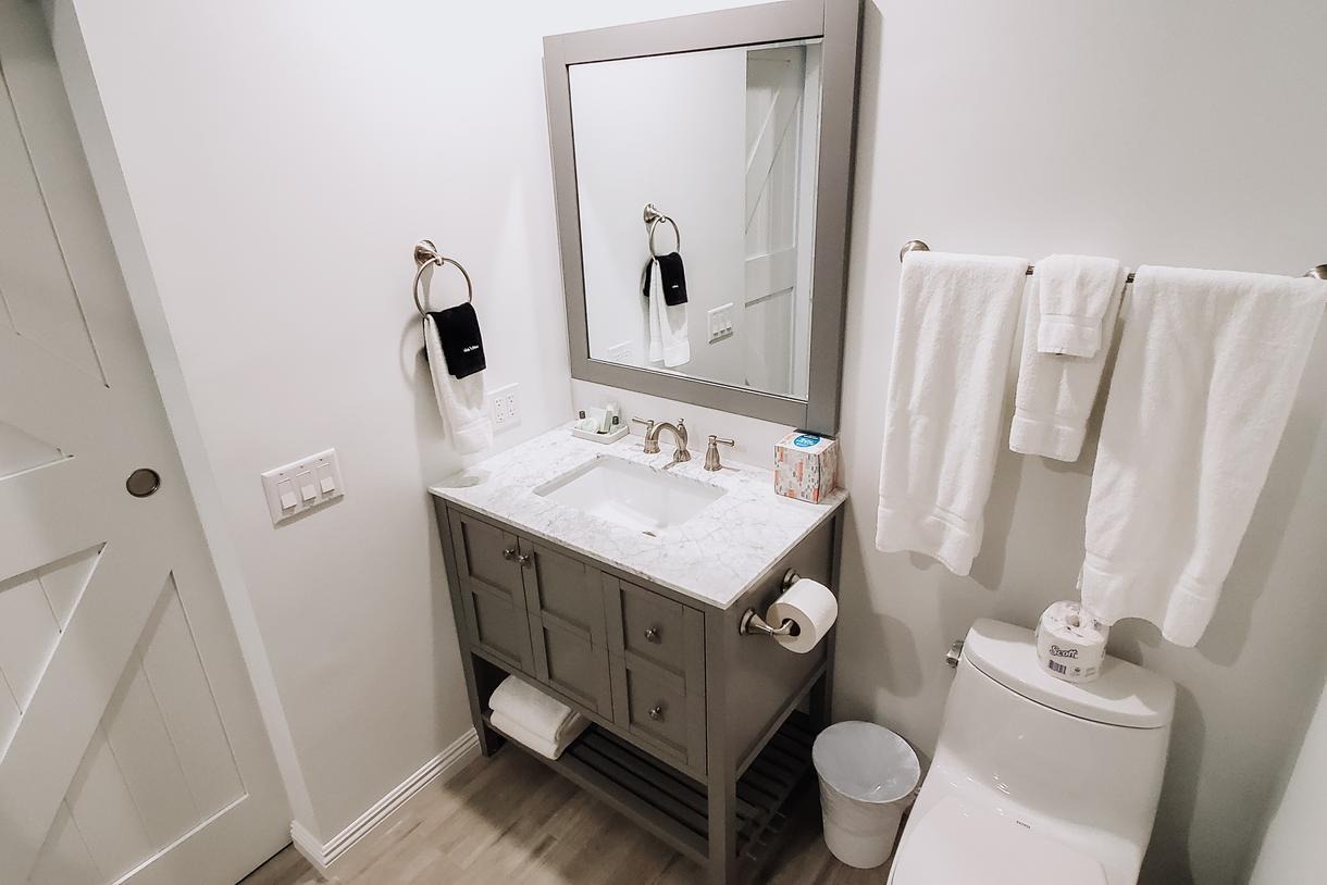 The cozy bathrooms provide a place to relax and unwind.