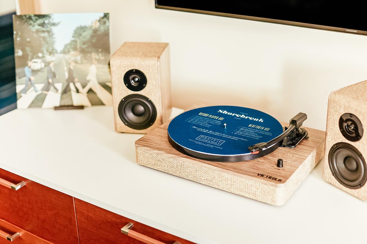 Every guest room features a vinyl record player.