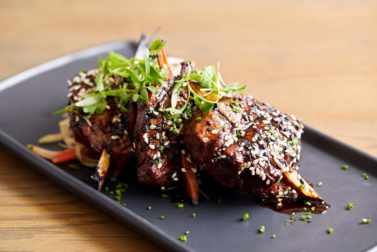 The sugarcane beef tenderloin is doused in Thai glaze and wasabi butter.