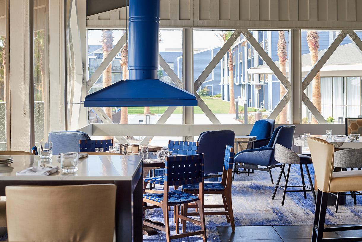 The restaurant interior mirrors its nautical surroundings. Photo by Peter Christiansen Valli.