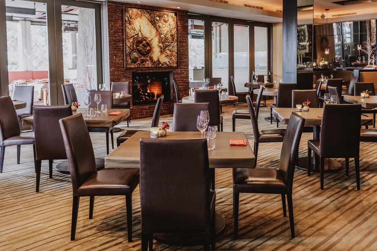 The elegant dining room beckons with its cozy ambience.