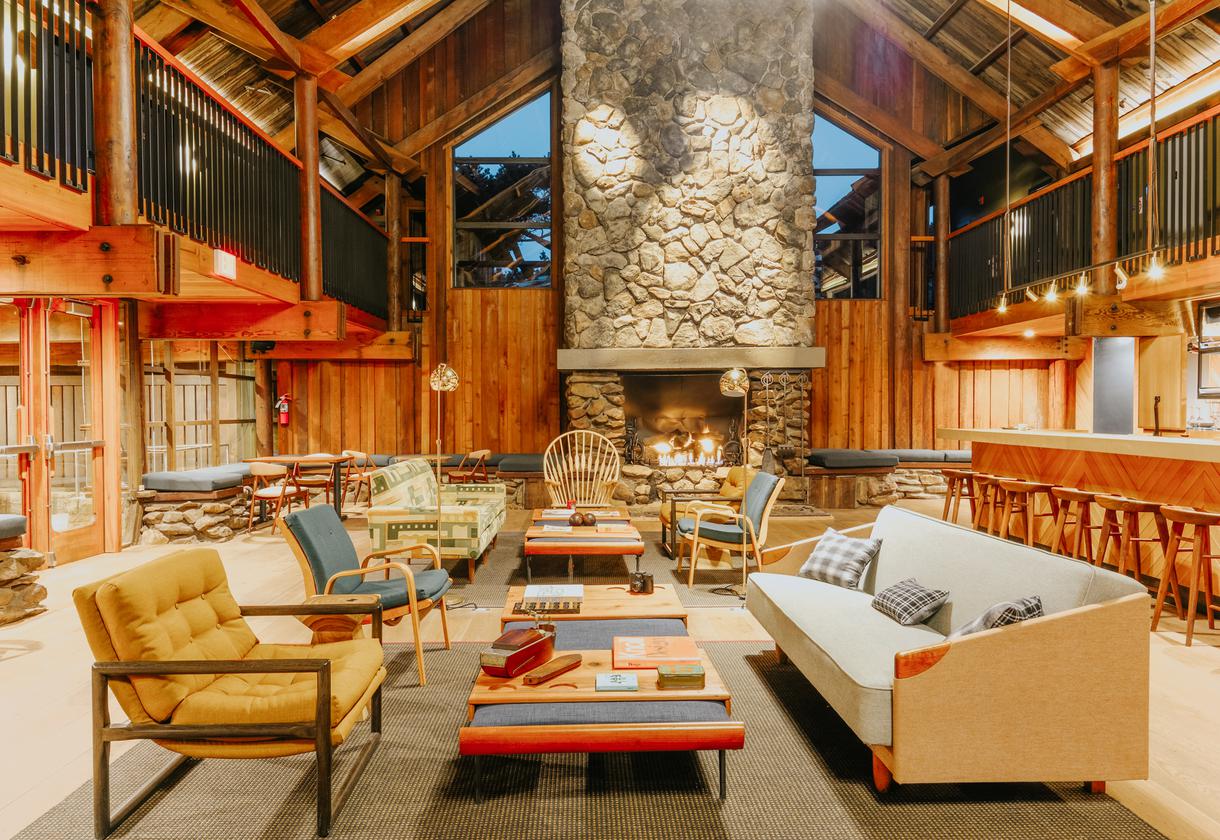 The welcoming lobby beckons with its grand fireplace.